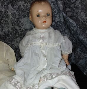 Elegant White Doll with Blue Shoes